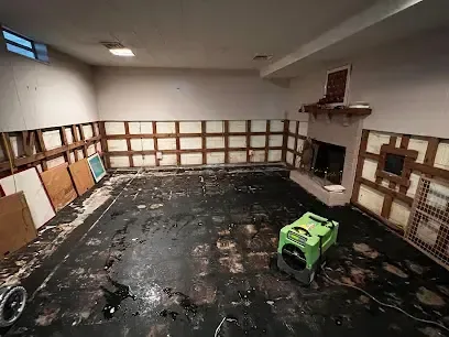 Chanhassen basement water damage: a finished lower level opened up for drying